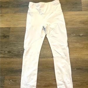 Fabletics white winter running leggings with side pockets.  Size S and long.